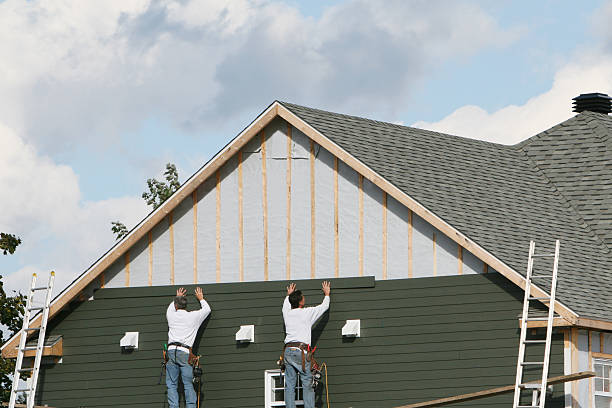 Professional Emergency Siding Repair technician working in Baldwin, MD